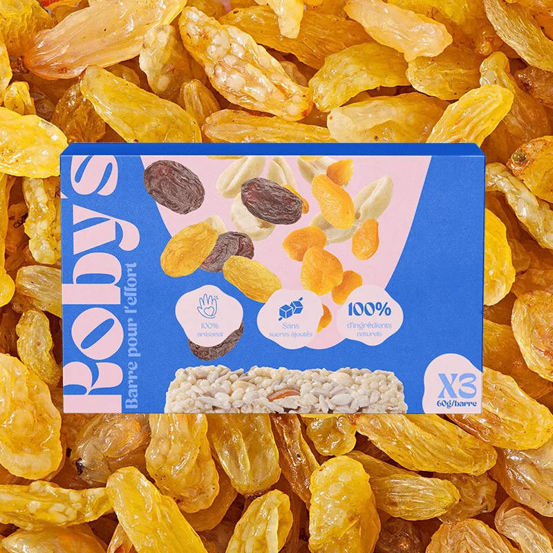 Packaging Roby's Bar, barre pour l'effort aux fruits secs, sur fond de raisins secs